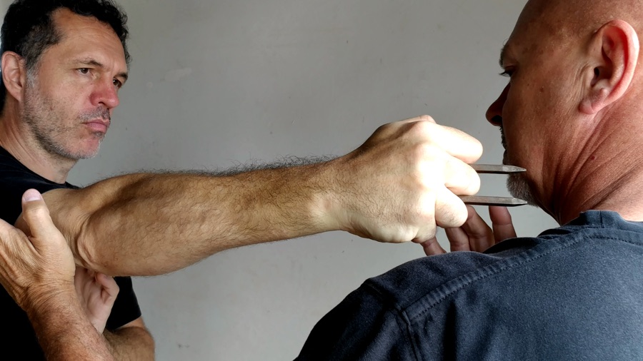 Pieter de Wet demonstrates the bone piercer. Ballito Martial Arts